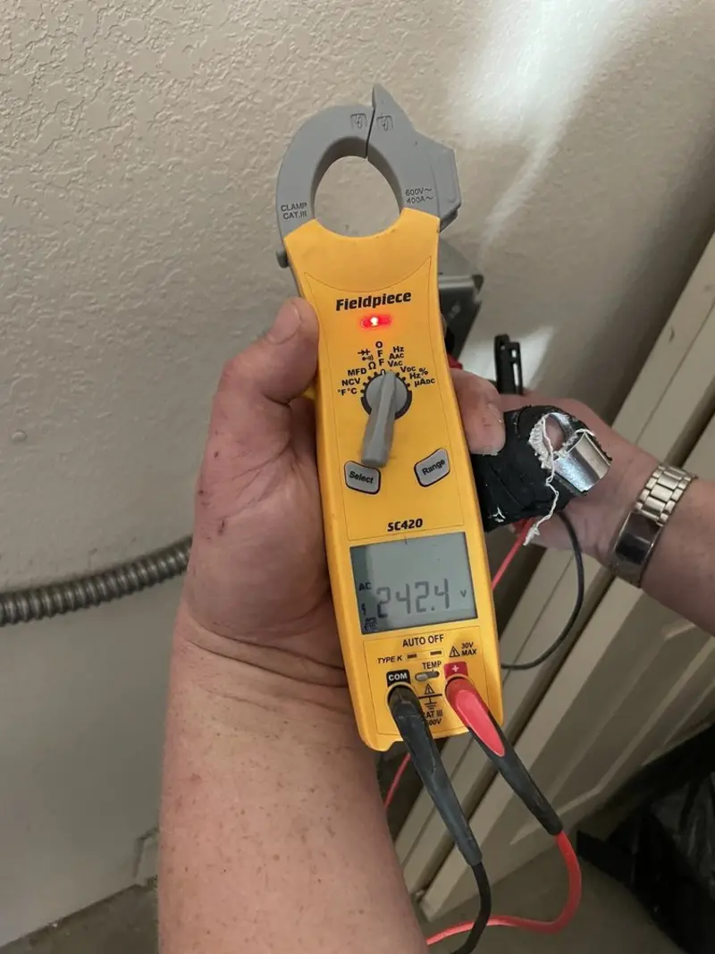 Voltage testing with clamp meter during Aluminum Wiring Replacement in Mount Vernon